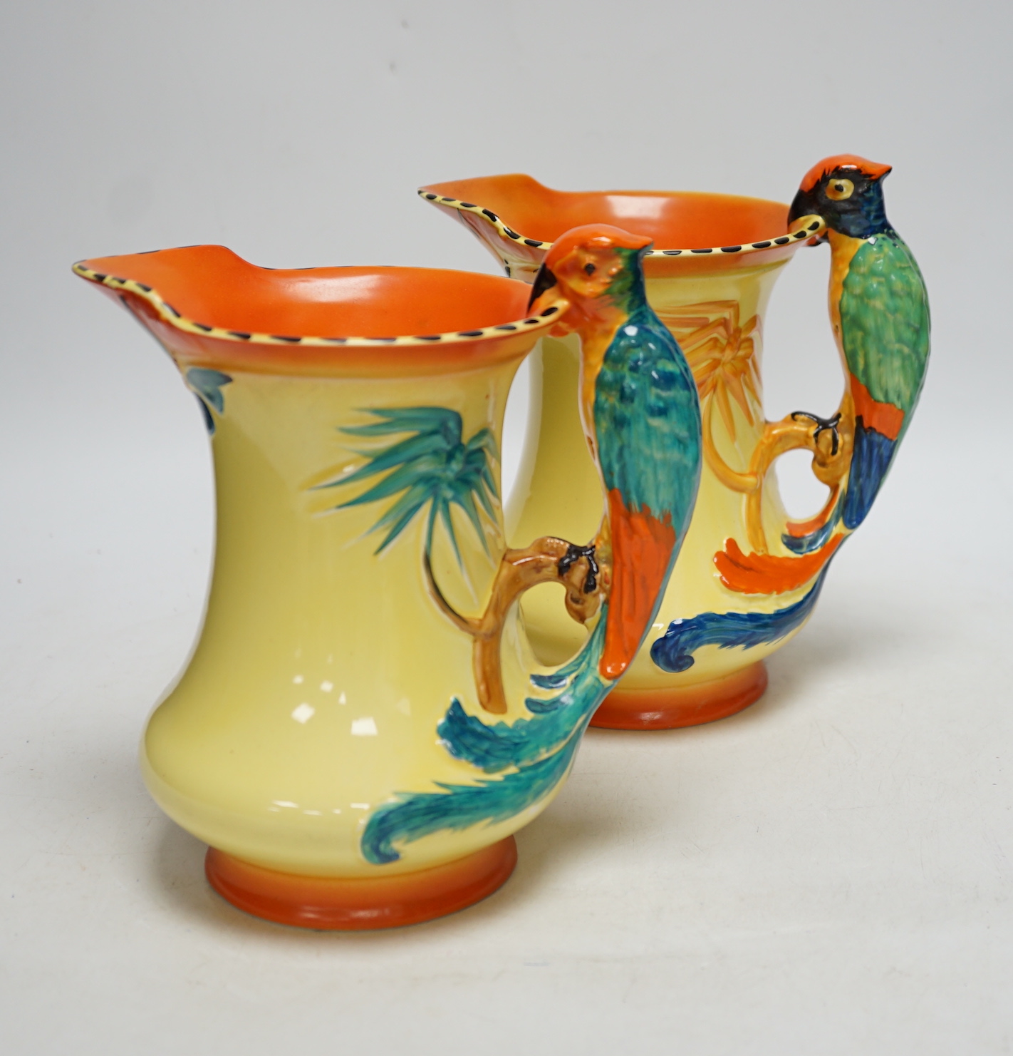 A pair of British Burleigh novelty ‘parakeet’ jugs, 20cm